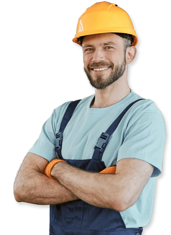 Operaio con tuta da lavoro e casco per la sicurezza giallo